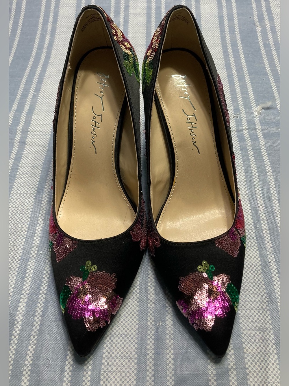 Betsey Johnson “Jonas” black pointed toe heel with sequined floral design.